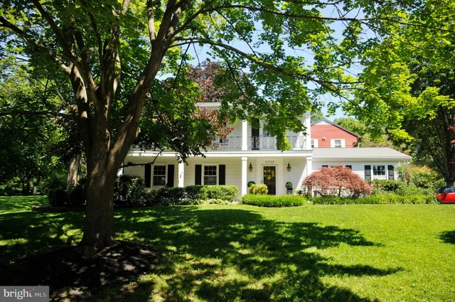 a kitchen with a stove a sink and a refrigerator