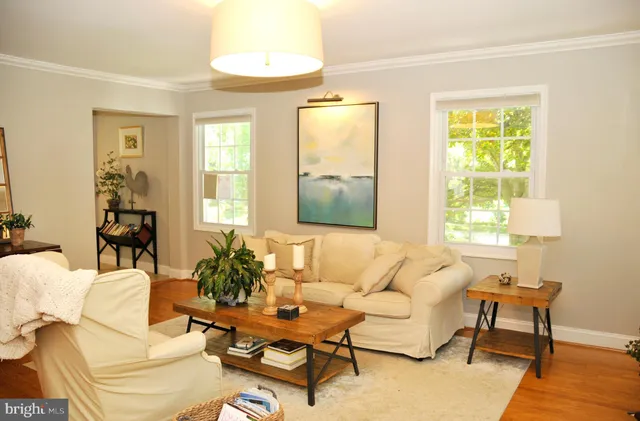a bathroom with a sink a toilet and shower curtain