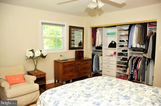 a living room with fireplace furniture and a flat screen tv