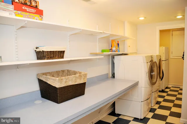 a kitchen with stainless steel appliances granite countertop a sink and a stove