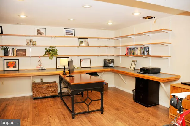 a view of a workspace with furniture