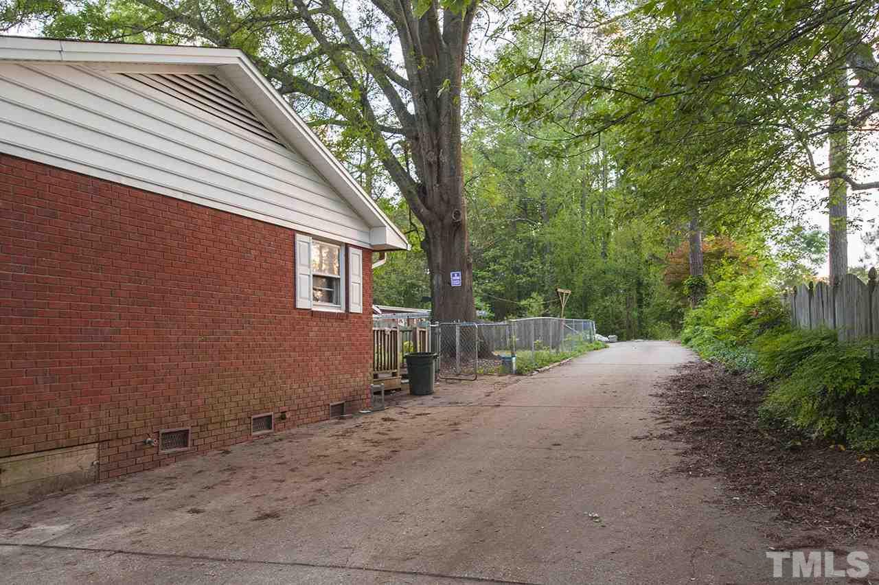 5612 Old Stage Road Raleigh, NC 27603 - Photo 2 of 5 a view of backyard and tree