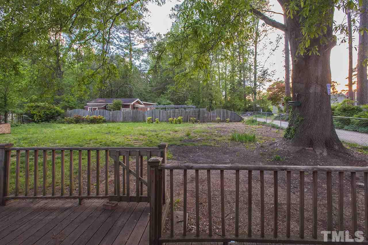 5612 Old Stage Road Raleigh, NC 27603 - Photo 4 of 5 a view of wooden deck with a yard