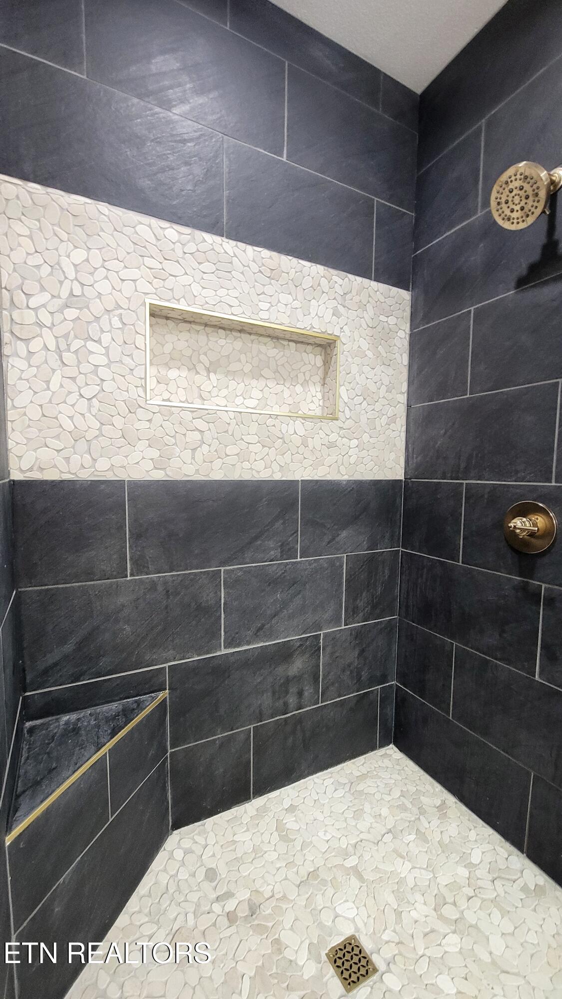 236 Meadowood Road Newport, TN 37821 - Photo 30 of 42 CUSTOM TILE IN MAIN ENSUITE