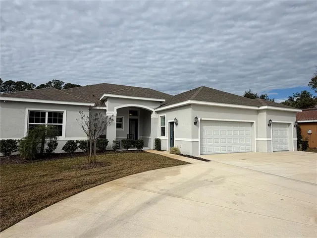 $475,000 | 10 Point Of Woods Drive, Palm Coast, FL 32164