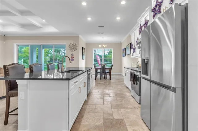 $475,000 | 10 Point Of Woods Drive, Palm Coast, FL 32164