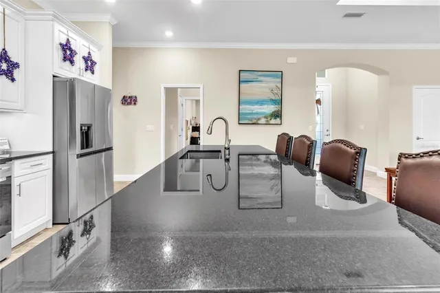 $475,000 | 10 Point Of Woods Drive, Palm Coast, FL 32164