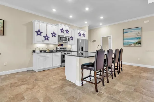 $475,000 | 10 Point Of Woods Drive, Palm Coast, FL 32164