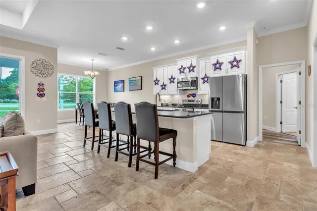 $475,000 | 10 Point Of Woods Drive, Palm Coast, FL 32164