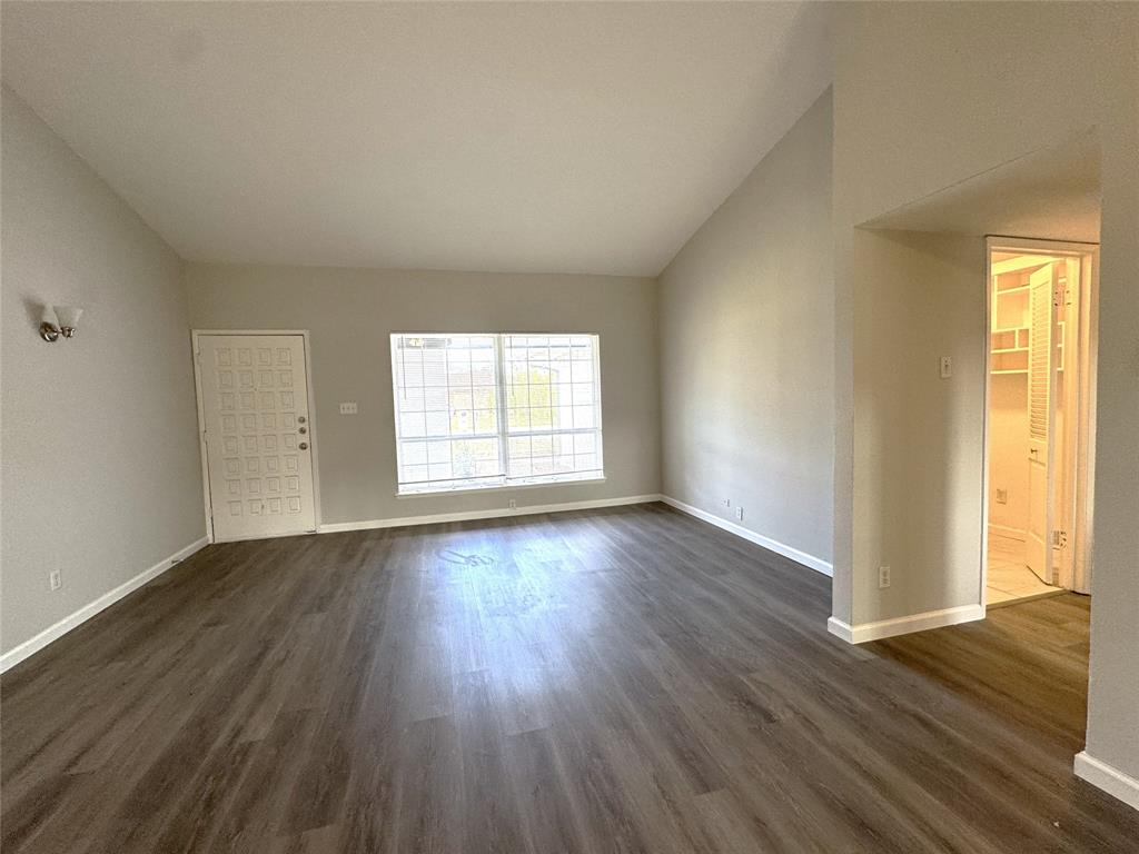 1612 Fairfield Drive Plano, TX 75074 - Photo 4 of 21 Entryway opens to a formal living area, which continues onto another living area and kitchen.
