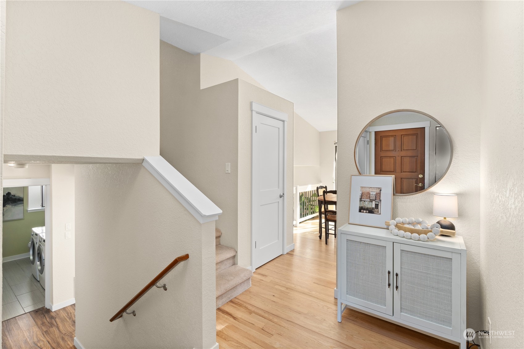 2402 169th Place Southeast Bothell, WA 98012 - Photo 23 of 38 a view of hallway with furniture and wooden floor