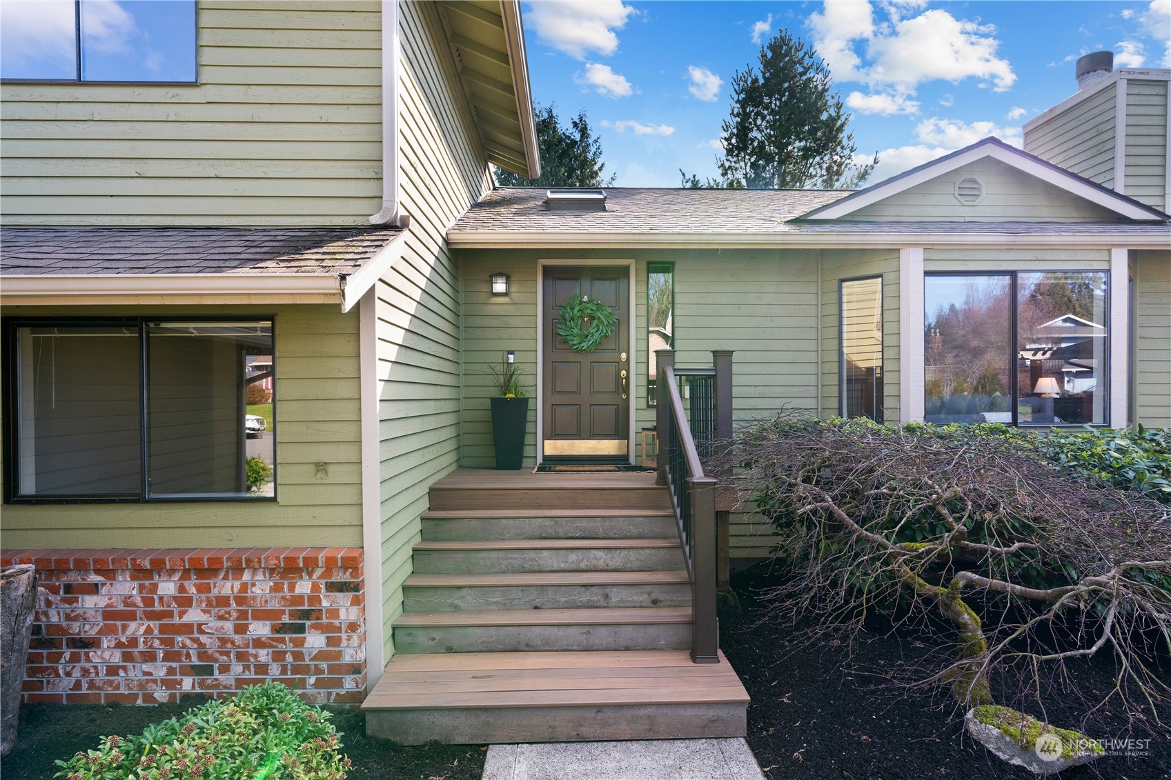 2402 169th Place Southeast Bothell, WA 98012 - Photo 3 of 38 a front view of a house