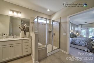 2973 Findley Road, Unit BF6 202 Statesville, NC 28625 - Photo 22 of 34 a en suite bathroom with a granite countertop sink mirror and shower