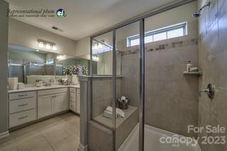 2973 Findley Road, Unit BF6 202 Statesville, NC 28625 - Photo 23 of 34 a bathroom with a shower sink and mirror