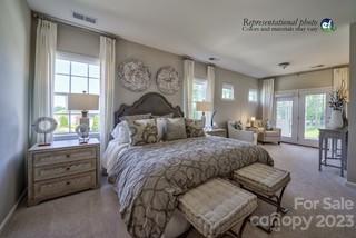 2973 Findley Road, Unit BF6 202 Statesville, NC 28625 - Photo 26 of 34 a bedroom with a bed window and couch