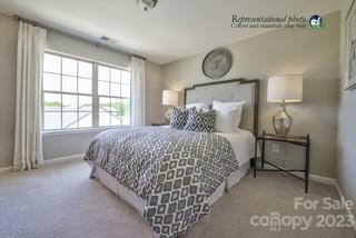 2973 Findley Road, Unit BF6 202 Statesville, NC 28625 - Photo 29 of 34 a bedroom with a bed and a window