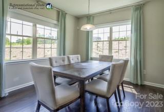 2973 Findley Road, Unit BF6 202 Statesville, NC 28625 - Photo 5 of 34 a view of a dining room with furniture window and wooden floor