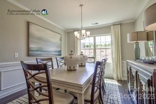 2973 Findley Road, Unit BF6 202 Statesville, NC 28625 - Photo 7 of 34 a view of a dining room with furniture window and outside view