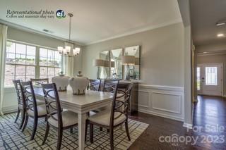 2973 Findley Road, Unit BF6 202 Statesville, NC 28625 - Photo 8 of 34 a view of a dining room with furniture window and wooden floor