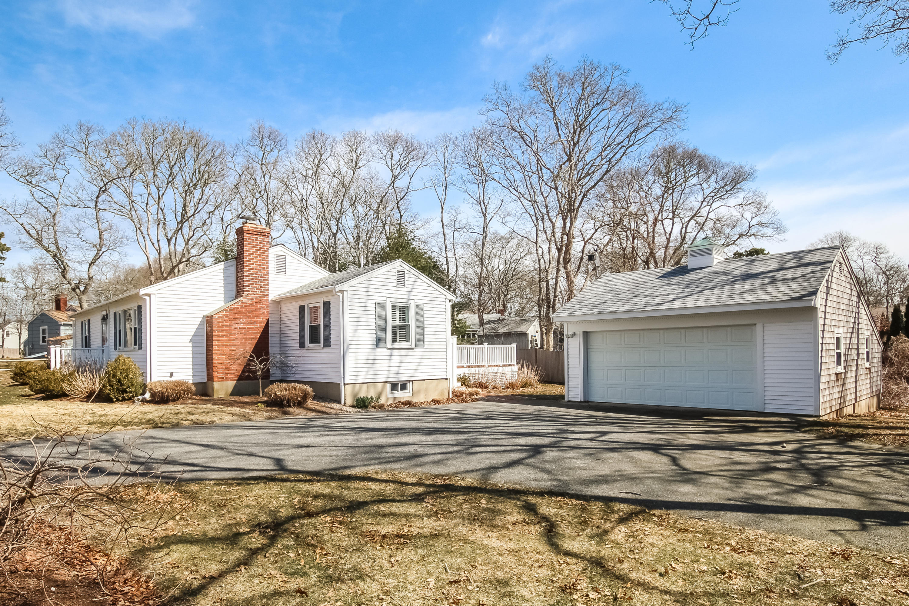 348 Strawberry Hill Road Centerville, MA 02632 - Photo 29 of 32 a view of the house with a yard