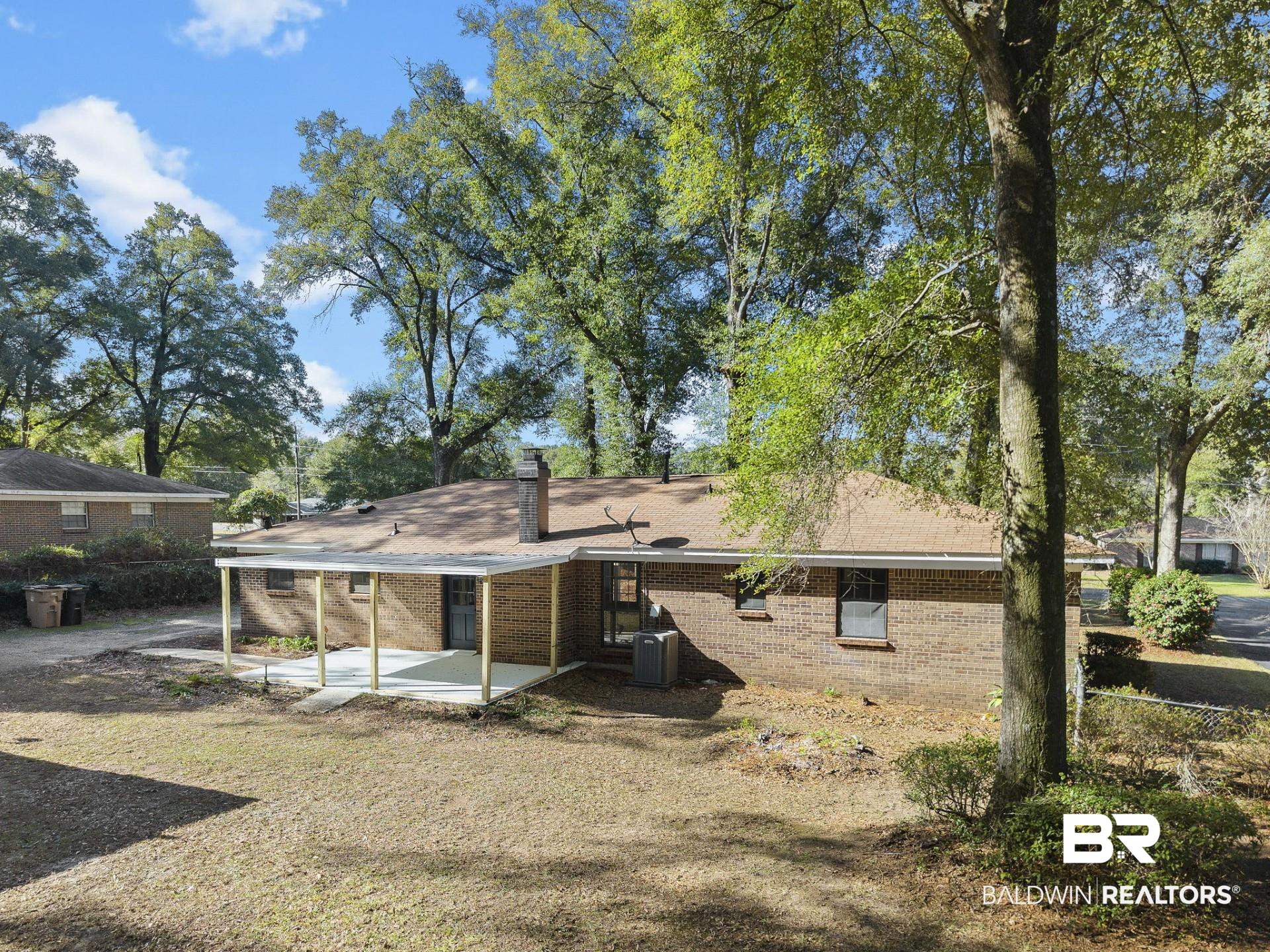 3270 Graham Road North Mobile, AL 36618 - Photo 54 of 54 Rear view of property featuring a patio and central AC