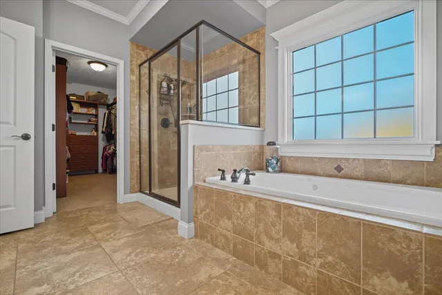 a bathroom with a bathtub and a sink