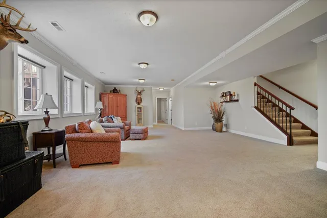 a kitchen with a sink cabinets and window