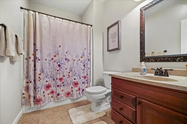 a view of wooden deck with a ocean