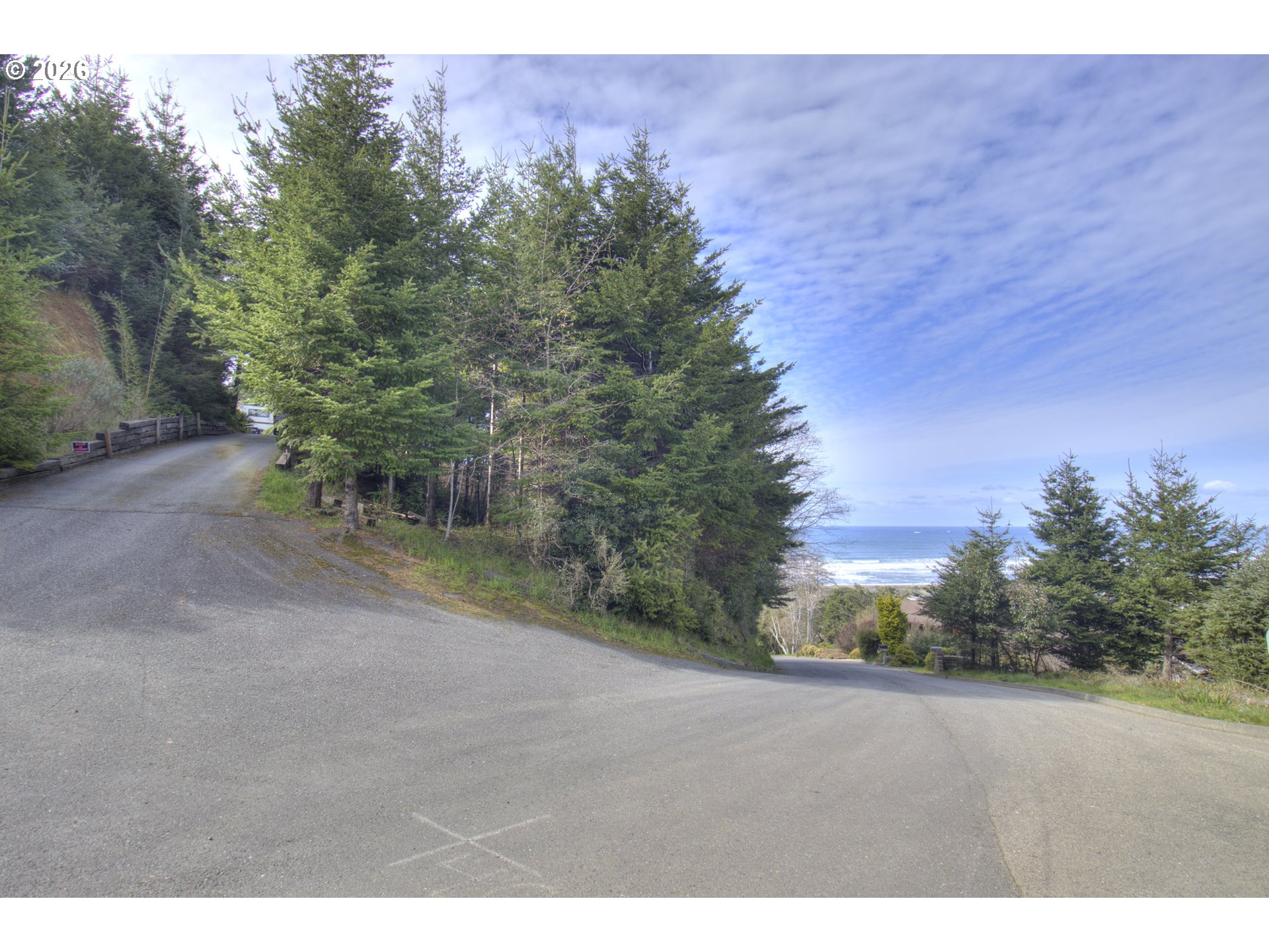 Seaview Lane Gold Beach, OR 97444 - Photo 1 of 8 a view of a field with trees in background