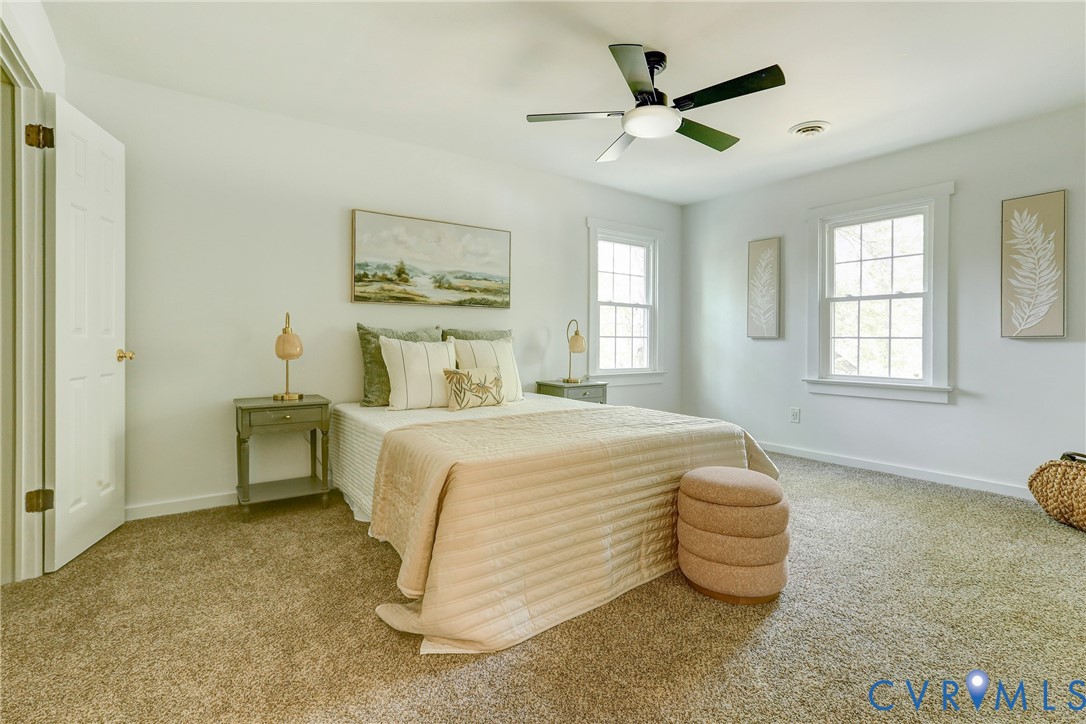 661 Greencastle Road Chesterfield, VA 23236 - Photo 13 of 28 a bedroom with a bed and window