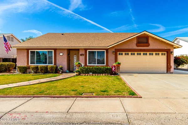 a view of front of house with garage