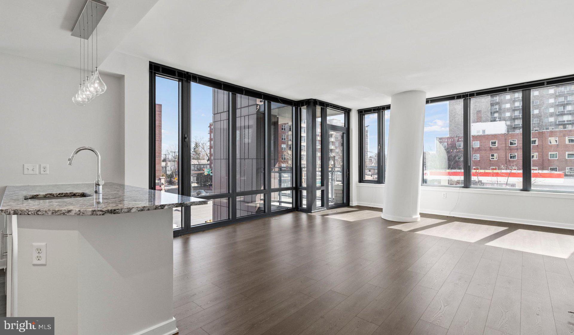 8300 Wisconsin Avenue, Unit 2B1617 Bethesda, MD 20814 - Photo 99 of 150 a view of an entryway with wooden floor