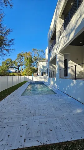 a front view of building with yard