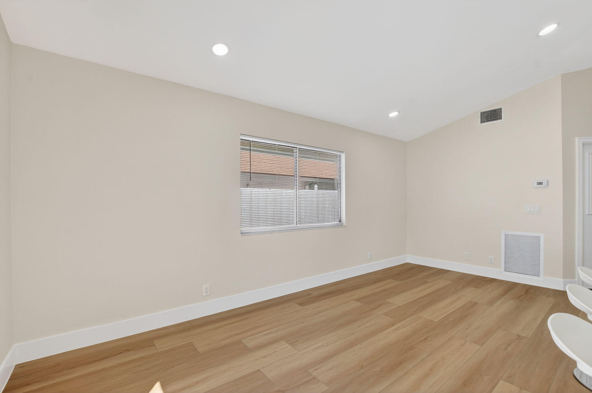 22732 Pickerel Circle Boca Raton, FL 33428 - Photo 14 of 38 a view of a room with wooden floor and window