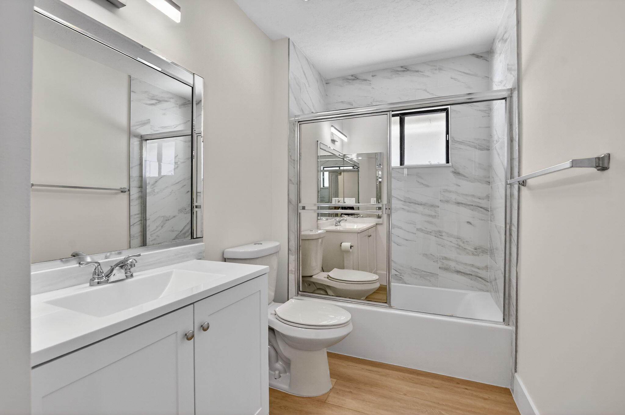22732 Pickerel Circle Boca Raton, FL 33428 - Photo 28 of 38 a bathroom with a toilet a sink and a bathtub