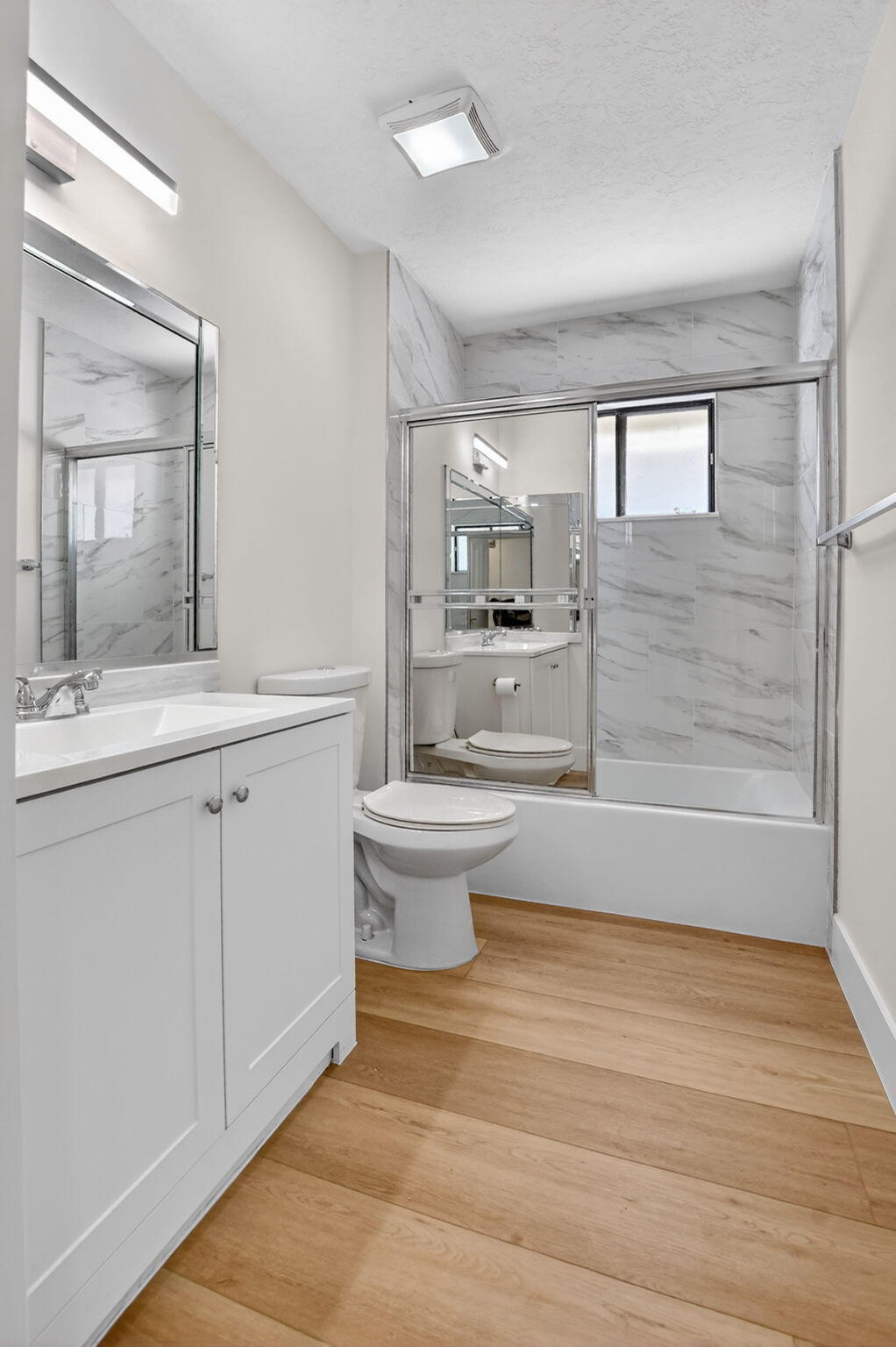 22732 Pickerel Circle Boca Raton, FL 33428 - Photo 29 of 38 a bathroom with a sink a toilet and shower