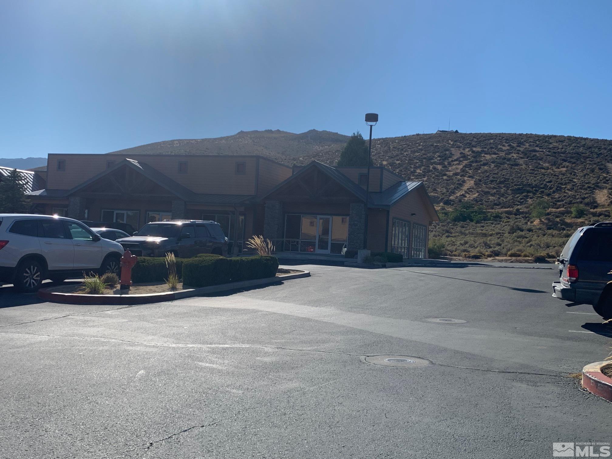 4560 South Carson Street, Unit 3 & 4 Carson City, NV 89701 - Photo 1 of 4 a view of a car parked in front of a house