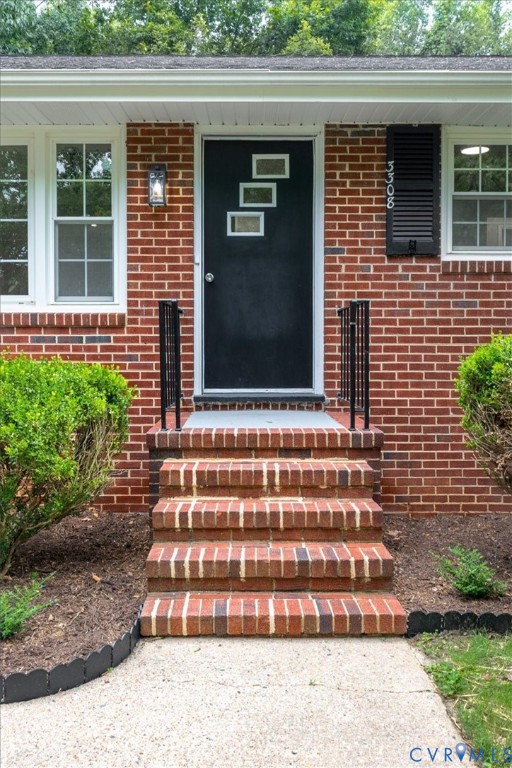 3308 Sylvania Road Chester, VA 23831 - Photo 4 of 55 Brick exterior featuring white-framed windows, a b
