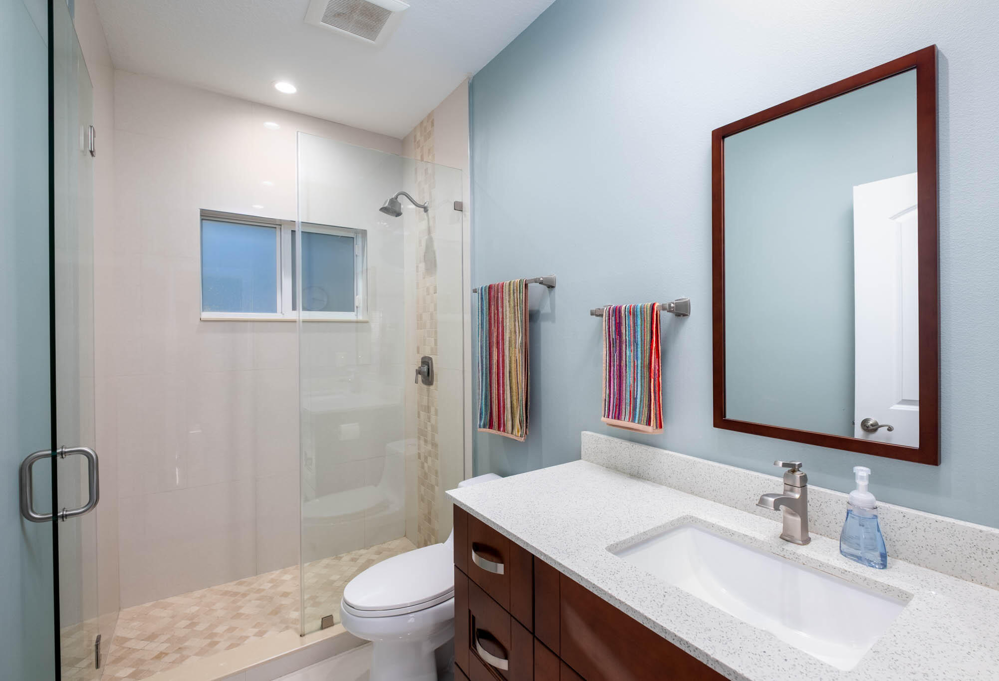 53 Jenny Lane Key Largo, FL 33037 - Photo 14 of 26 a bathroom with a sink a toilet a shower and a mirror