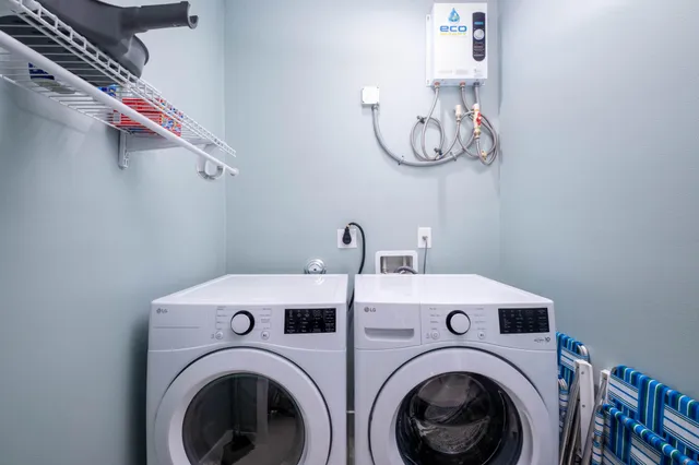 a utility room with dryer and washer