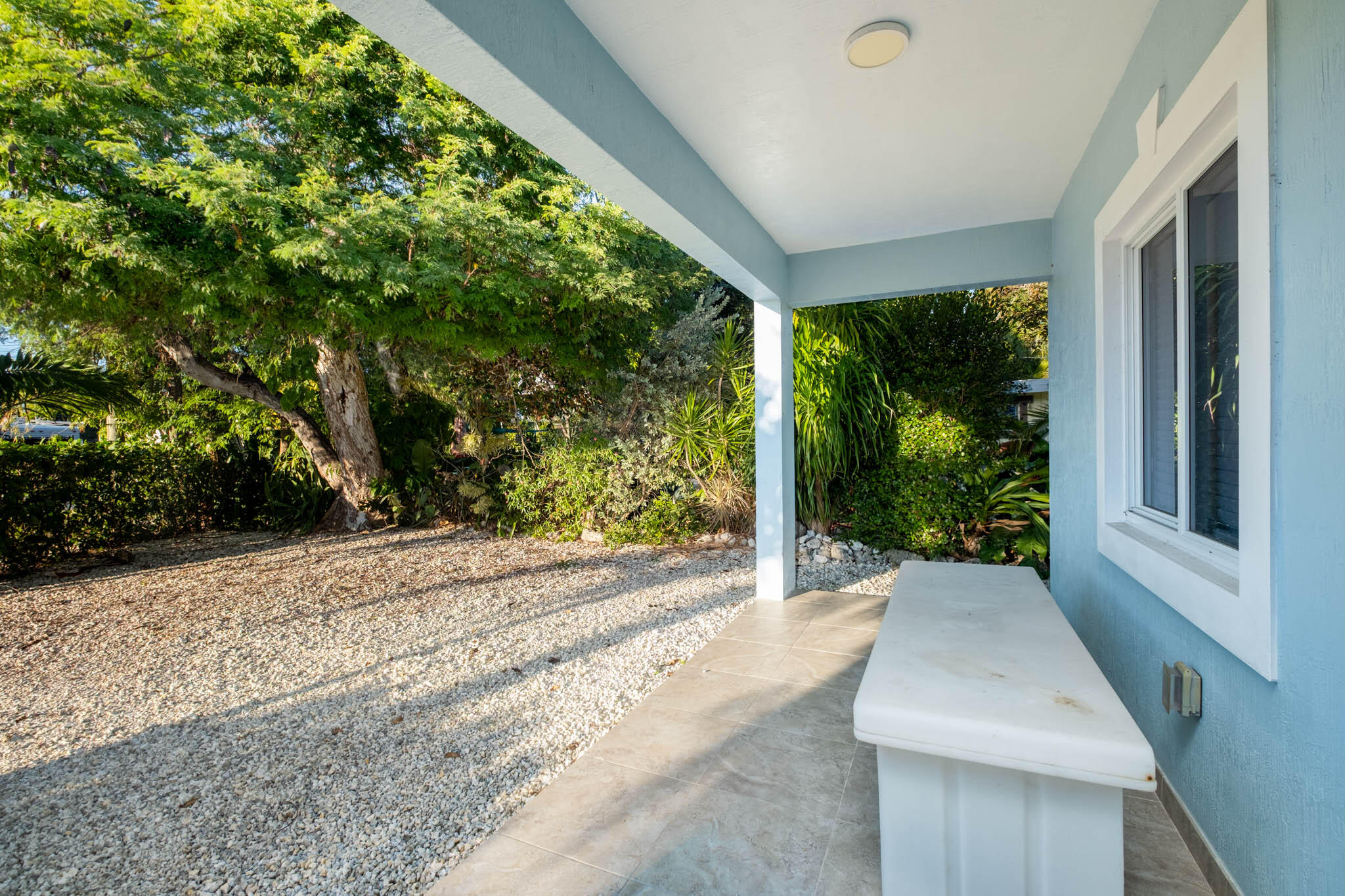 53 Jenny Lane Key Largo, FL 33037 - Photo 23 of 26 a view of a backyard with garden