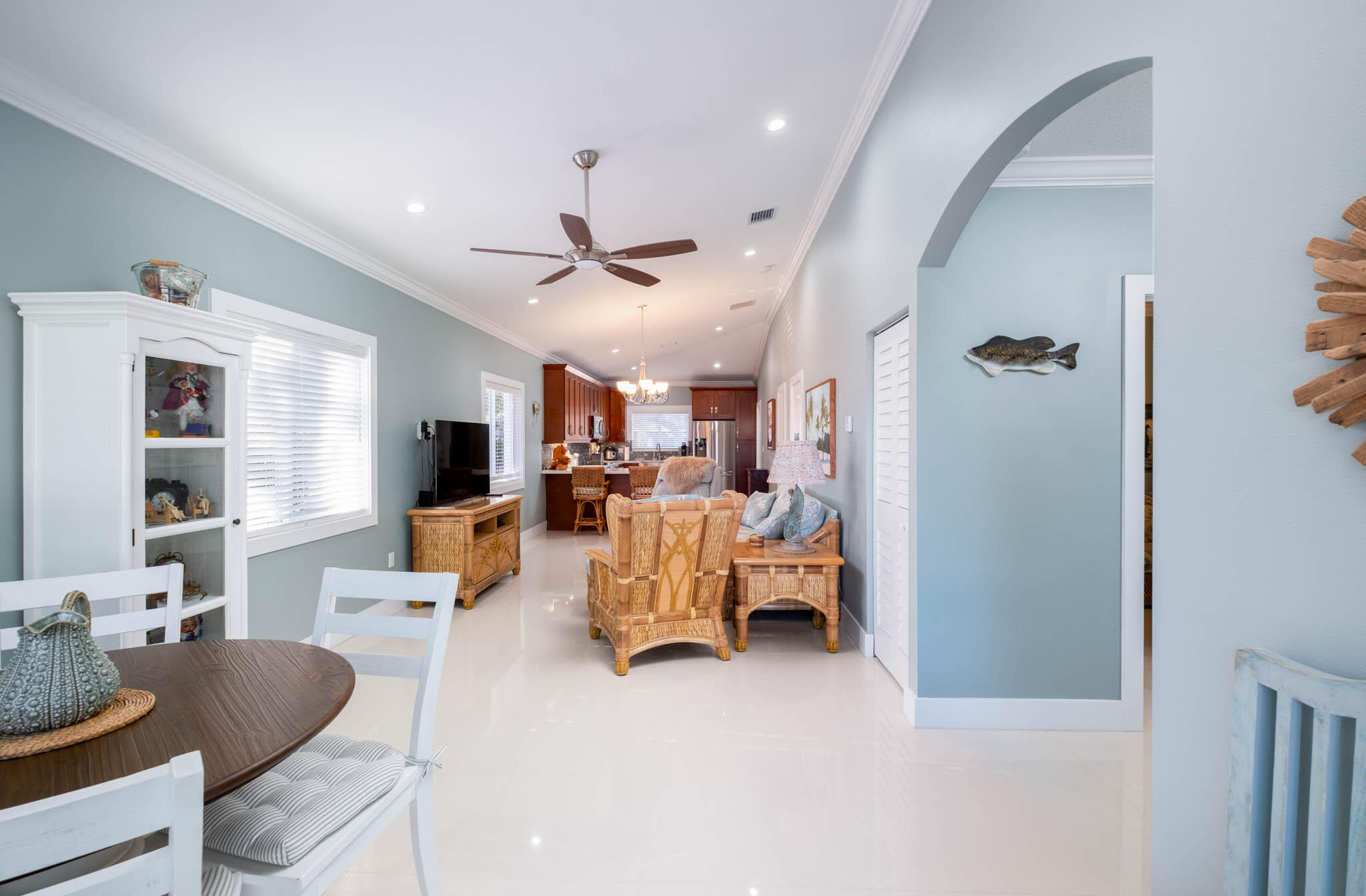 53 Jenny Lane Key Largo, FL 33037 - Photo 4 of 26 a living room with furniture and a chandelier