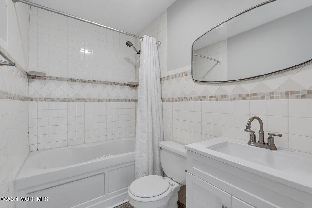 22 Spinnaker Way Waretown, NJ 08758 - Photo 21 of 29 a bathroom with a sink a toilet and shower