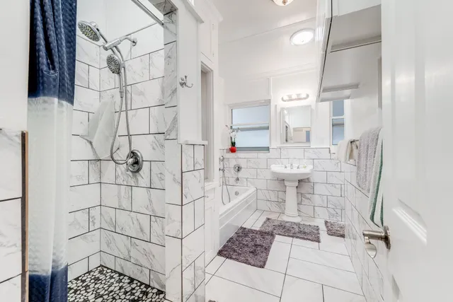 a bathroom with a sink and bathtub