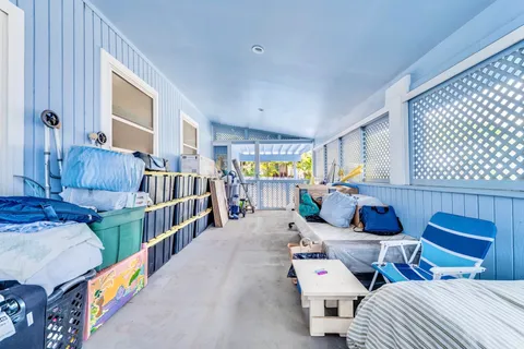 a utility room with sink dryer and washer