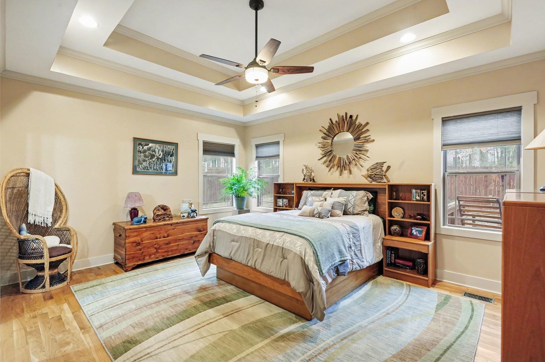 548 Strudwick Avenue Goodlettsville, TN 37072 - Photo 14 of 54 a spacious bedroom with a bed a dresser and a chandelier