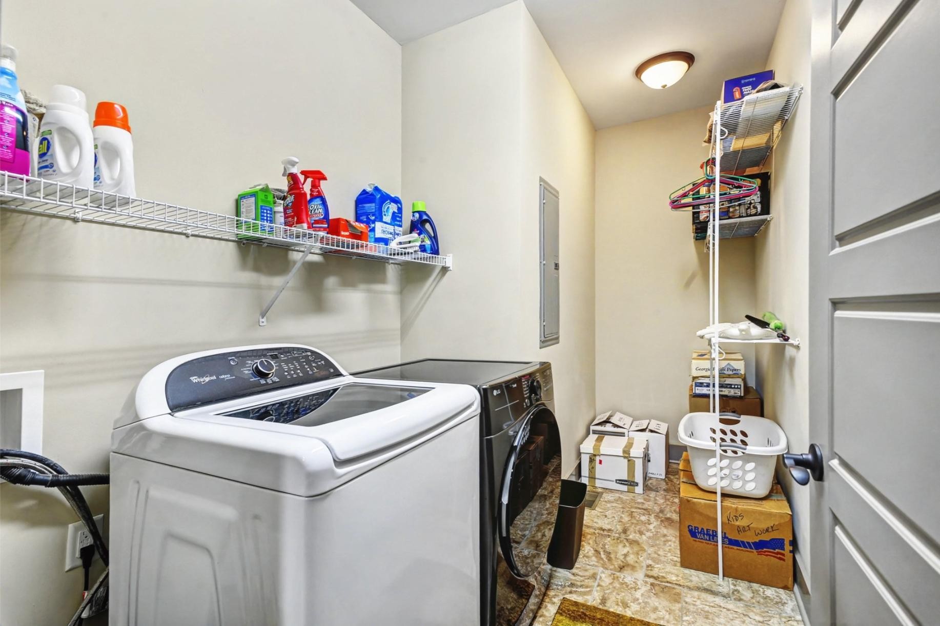 548 Strudwick Avenue Goodlettsville, TN 37072 - Photo 36 of 54 a utility room with dryer washer and shoe rack