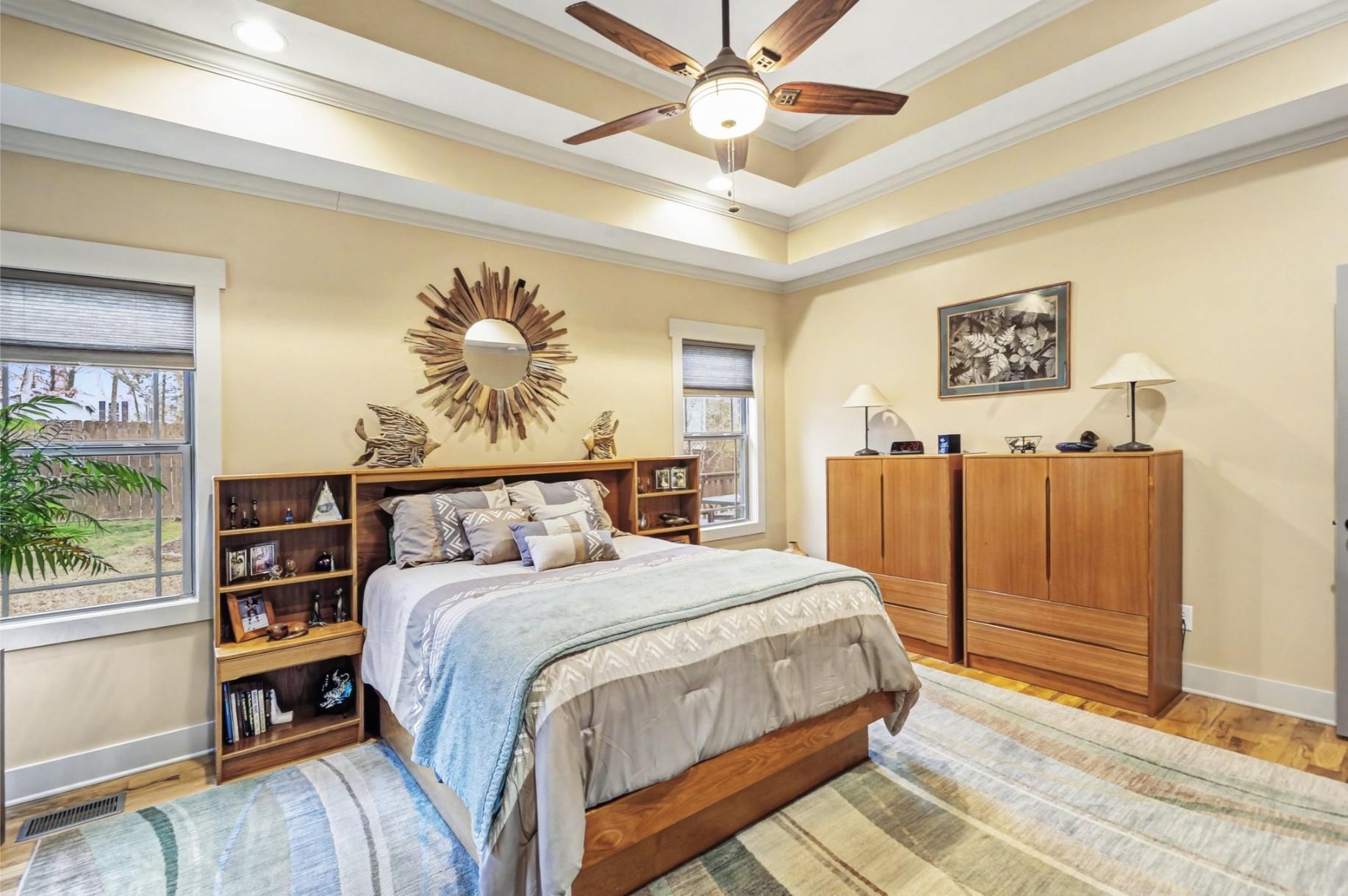548 Strudwick Avenue Goodlettsville, TN 37072 - Photo 41 of 54 a bedroom with a large bed and a chandelier