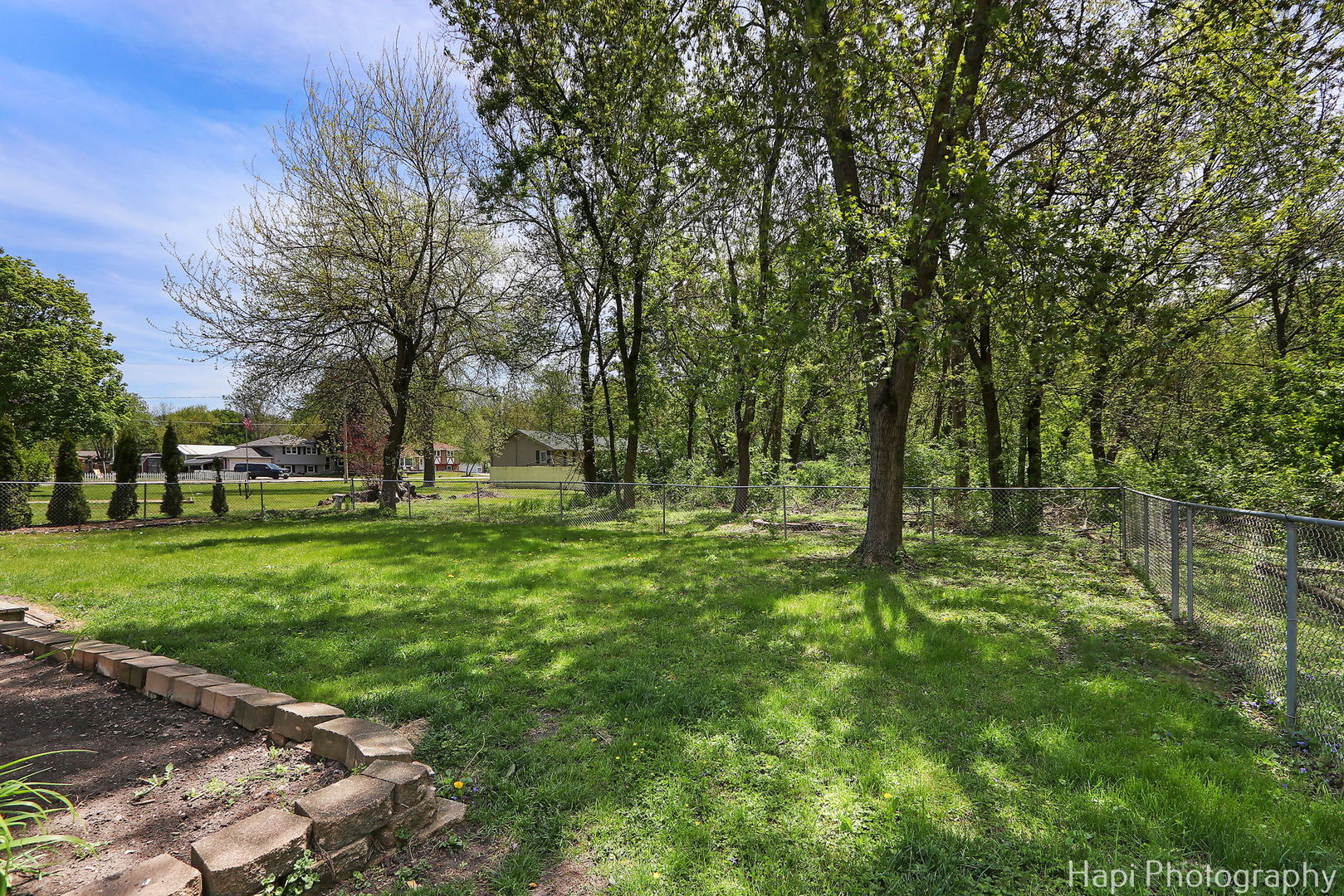 305 Pokagon Drive Algonquin, IL 60102 - Photo 19 of 28 a view of backyard with green space