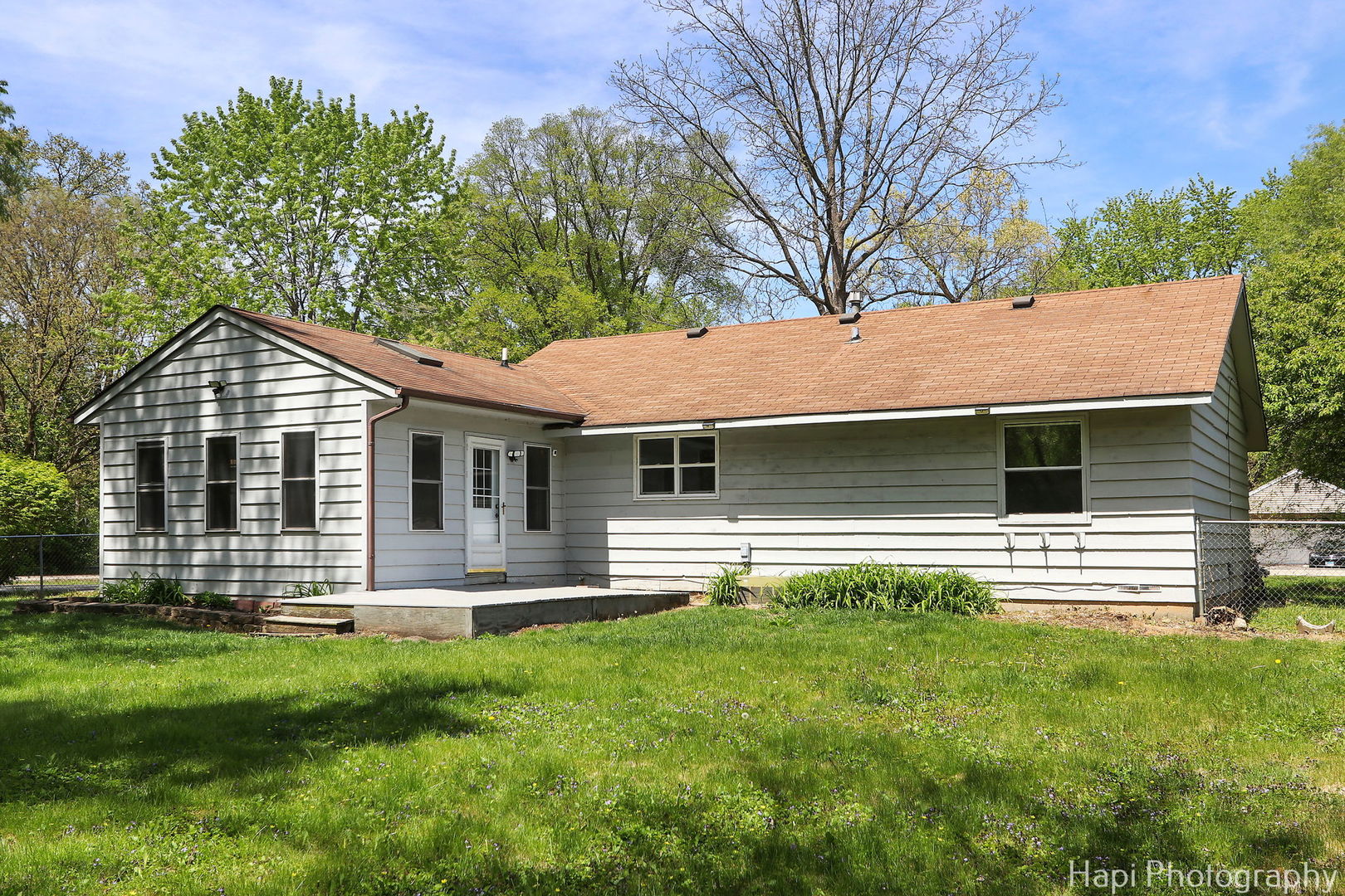 305 Pokagon Drive Algonquin, IL 60102 - Photo 21 of 28 a front view of house with yard and green space